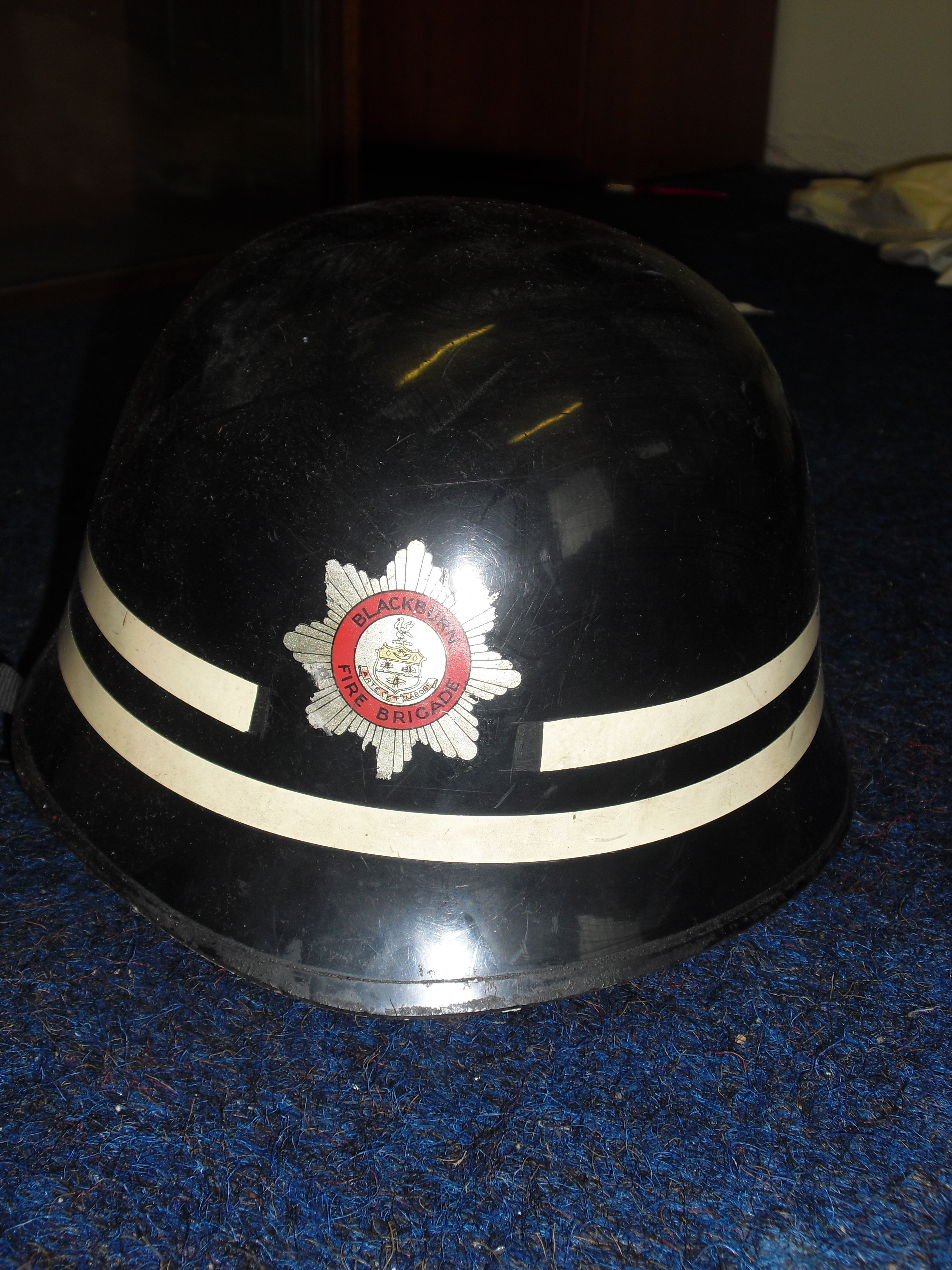 Fire helmet belonging to a sub officer rank Blackburn Fire History